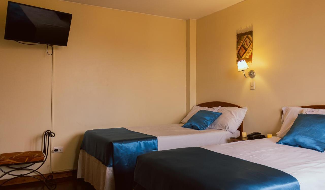 טאקנה Hostal Siglo 21 מראה חיצוני תמונה