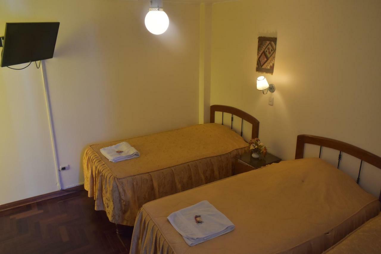 טאקנה Hostal Siglo 21 מראה חיצוני תמונה